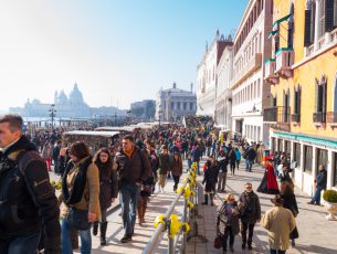 Venice, Italy- February 8, 2015: Crowd of tourists on St. Mark's square-Venice, Italy.